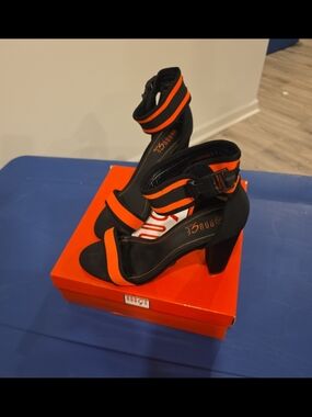 Bold Black and Orange Ankle-Strap Heels